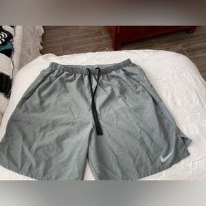 Nike Men's Light Gray Athletic Shorts with Black Drawstring